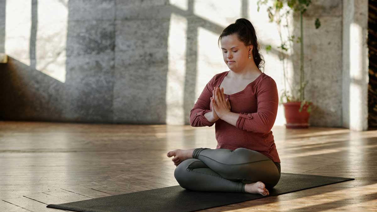 woman with Down syndrome doing yoga