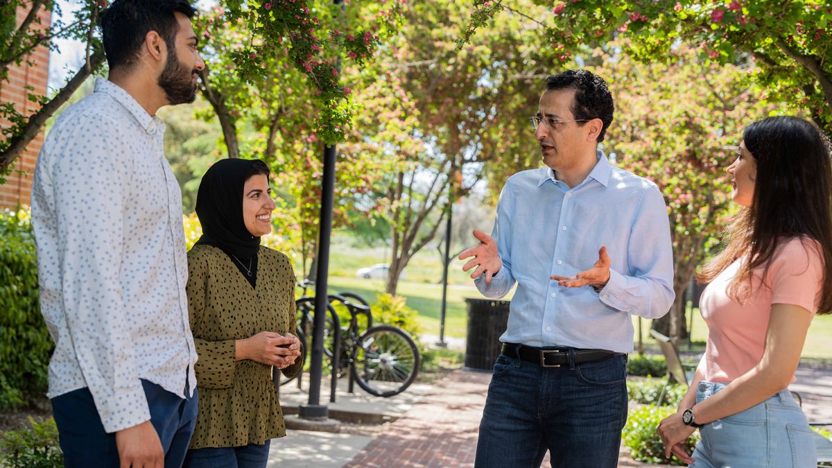 Professor Mamoun M. Alhamadsheh with students